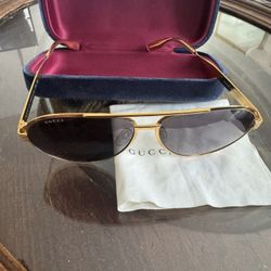 Gold Gucci Glasses 