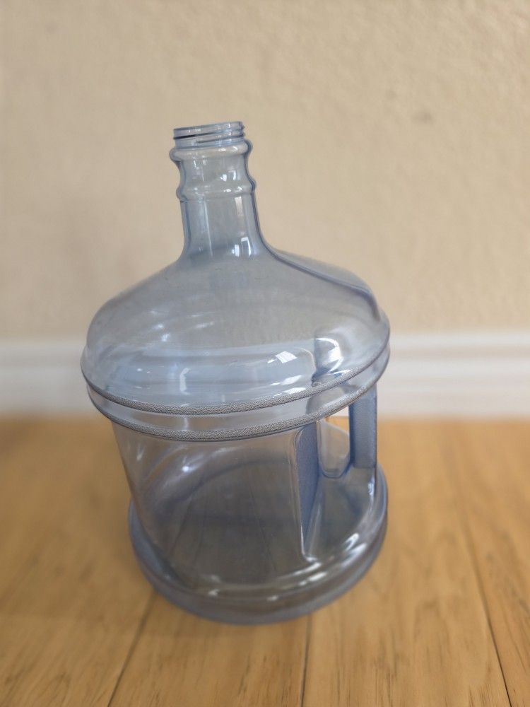 Water Bottle. 2 Gallon Size. Plastic Construction. Good Condition.