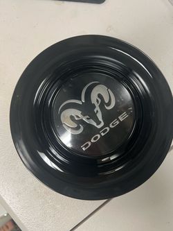 A set of dodge ram floating caps