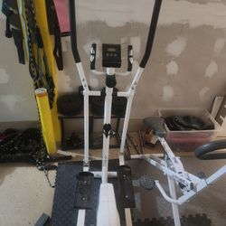 Elliptical, Assisted Squat Machine, 2 Workout Benches And On Bar Rack For Chest Day And Squats. 