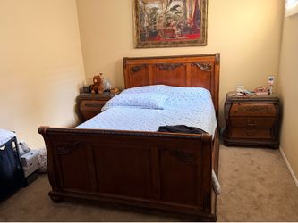 Ashley Millennium series queen size bed with 2 night stands, no mattress