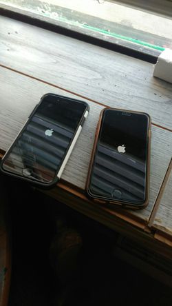 Two iPhones , iPhone 6s 128gb iphone 7128gb with cases !!