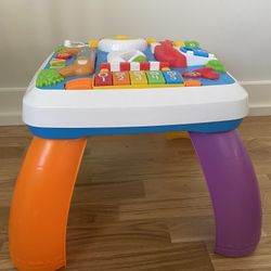 Laugh & Learn Baby to Toddler Toy, Around the Town Learning Table with Music Lights & Activities