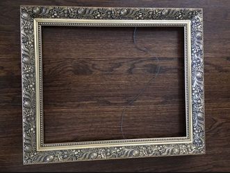 Wood carved frame in antique gold finish