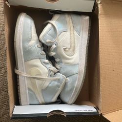 Blue And White Jordans With Glitter In The Nike Sign