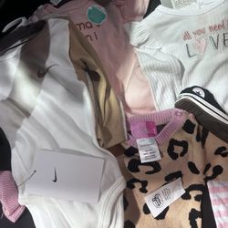 Baby Outfits , Nike, , three sets of three different kinds of outfits and then one kind of jumpsuit and some baby Chuck Taylor, Converse all brand new