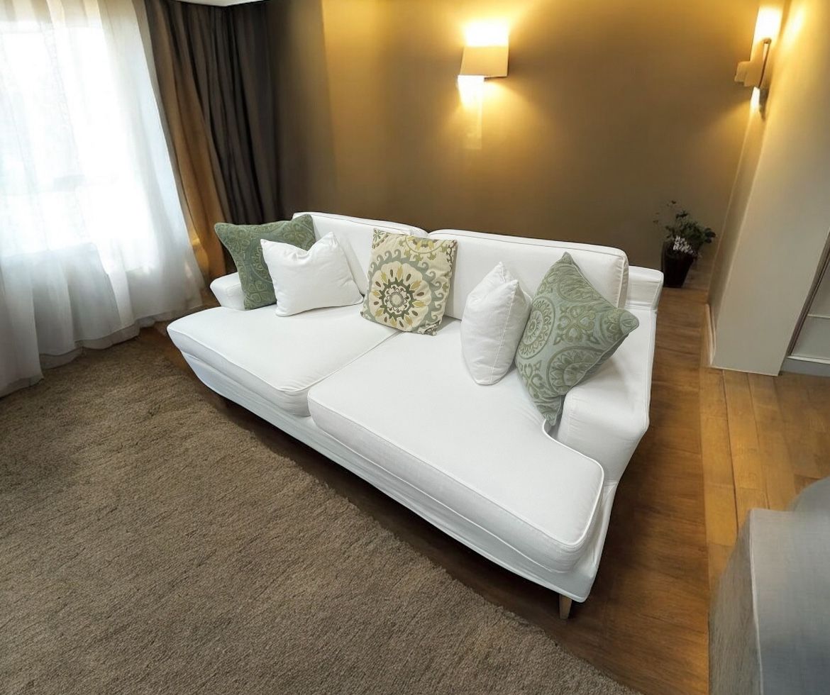 Extremely Comfortable 89” IKEA Couch & 5 Pillows from Non smoking Pet free home. Delivery Available