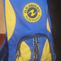 2 bags , blue and yellow item in the image is a U.S. Divers gear bag or backpack for carrying snorkeling or scuba diving equipment. It is often sold a