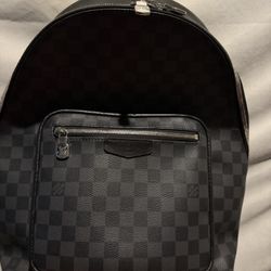 Louie Vuitton Book bag 