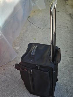 Tumi rolling carry on luggage