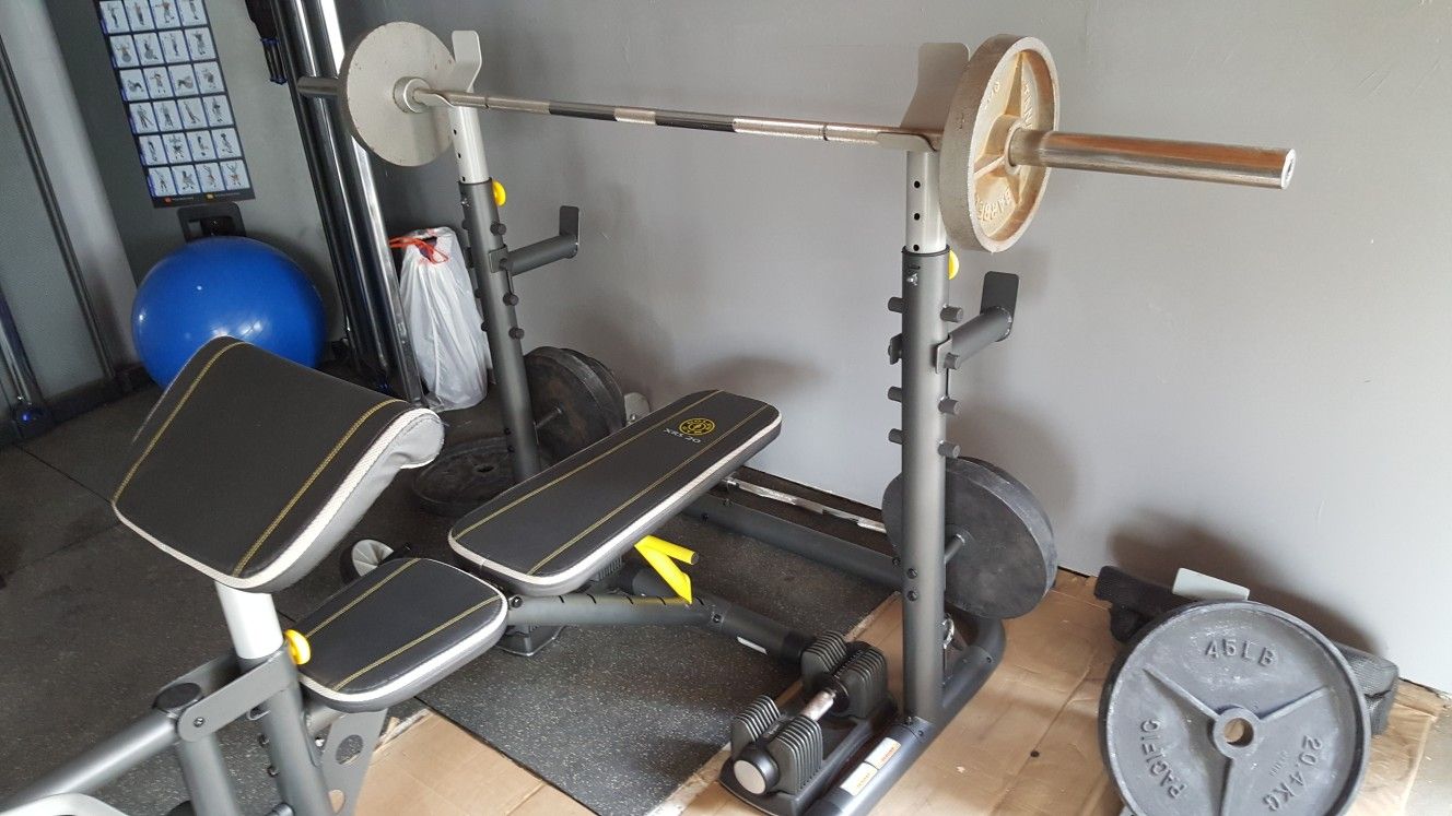 Lightly used bench press with squat rack