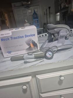 Neck Traction Device With Pump, Brand New, $50.00.