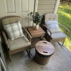 Outside Rocking Chairs With Table And Trashcan. 