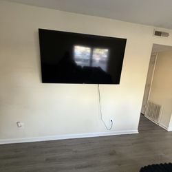 65” Tv , Tv mount included