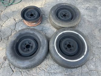 Four late 50s 14 inch Ford steelies 5 on 4.5 Drum brakes