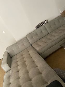 Grey L shaped couch