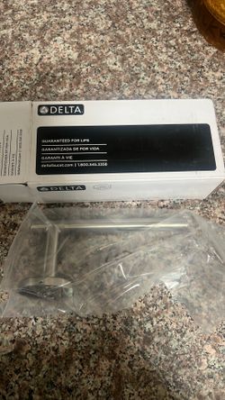 Delta tissue holder