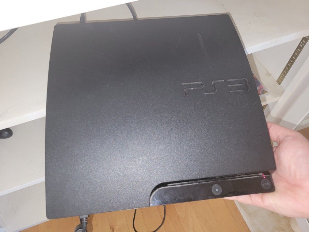 Playstation 3 with extra controller and games