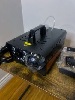 Fog machine with disco light