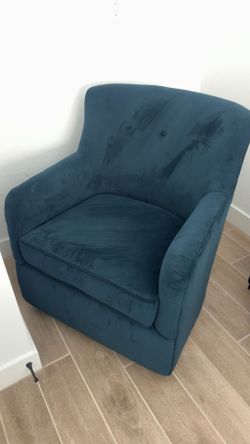 Blue velvet swivel chair