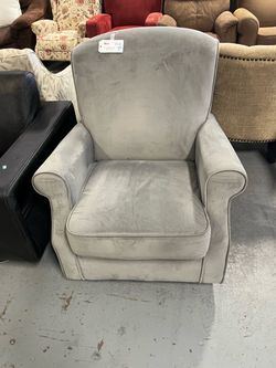 Grey rocking armchair (in store)