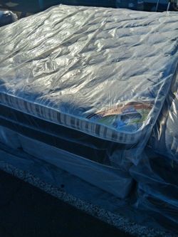 Brand New King Size super Pillowtop mattress and box spring free delivery depends on location