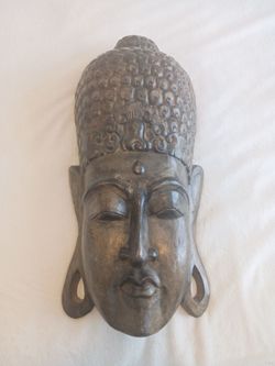 Hand carved wood Buddha head