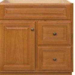 Glacier Bay
Hampton 30 in. W x 21 in. D x 33.5 in. H Bath Vanity Cabinet without Top in Oak