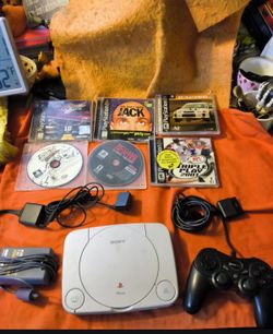 Sony playstation one with six games one controller all tested and works amazing will not separate