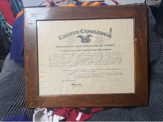 For sale is a framed pair of original United States Postmaster appointment certificates signed in print by President Calvin Coolidge and President Her