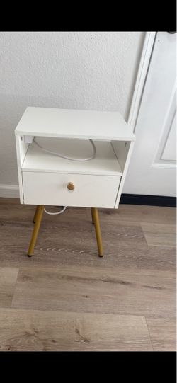 White/gold nightstand with charger