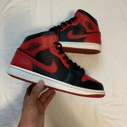 Jordan 1 Mid “ Banned”