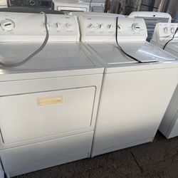 Kenmore top load washer and  electric dryer set