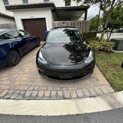 black tesla model 3 