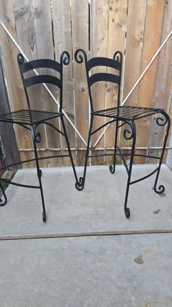 2 metal high chairs