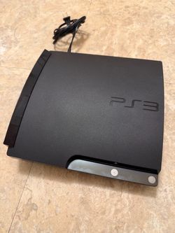 Sony PlayStation 3 Slim Console + Controllers and Games