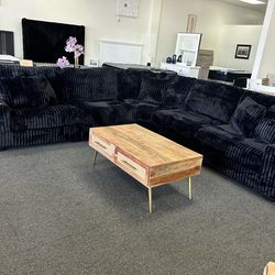 Extra deep and large sectional couch in black corduroy