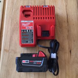 Milwaukee M18 Battery And Charger. Brand NEW.   NUEVO.