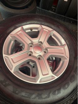 Goodyear 4 used 245/75/17 Tires with Jeep wrangler rims