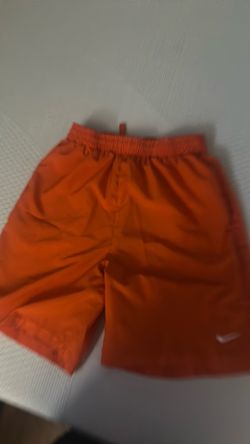 Orange Nike shorts