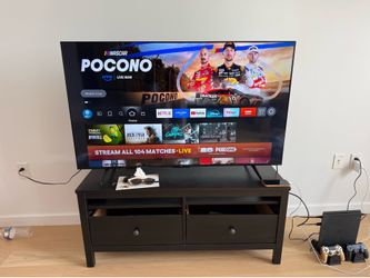 TCL 58” Smart TV along with the stand