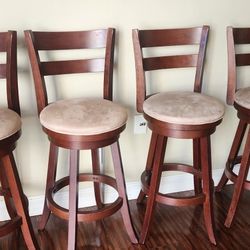 4 Bar Stools With Cushioned Seats