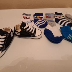 Baby Converse sneakers size 4 ( with 7 pair of socks)