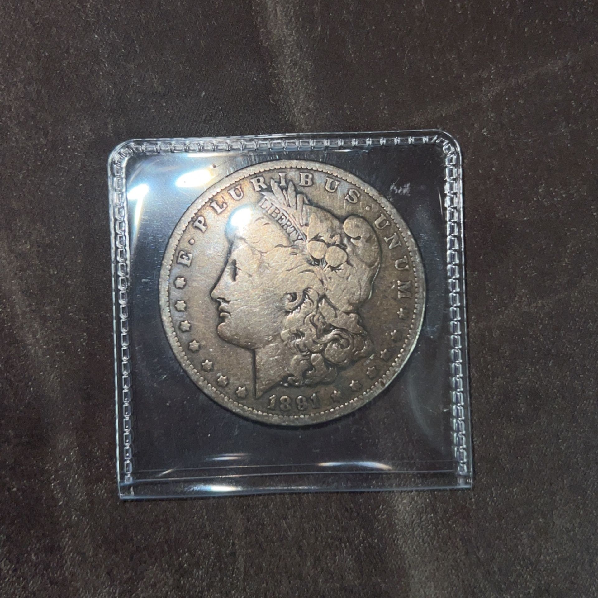 1891 Morgan Silver Dollar. 1.5carot Ruby Gemstone