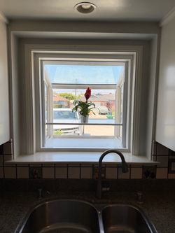 White Vinyl Sliding Window