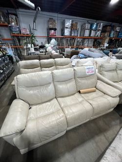 Cream leather recliners