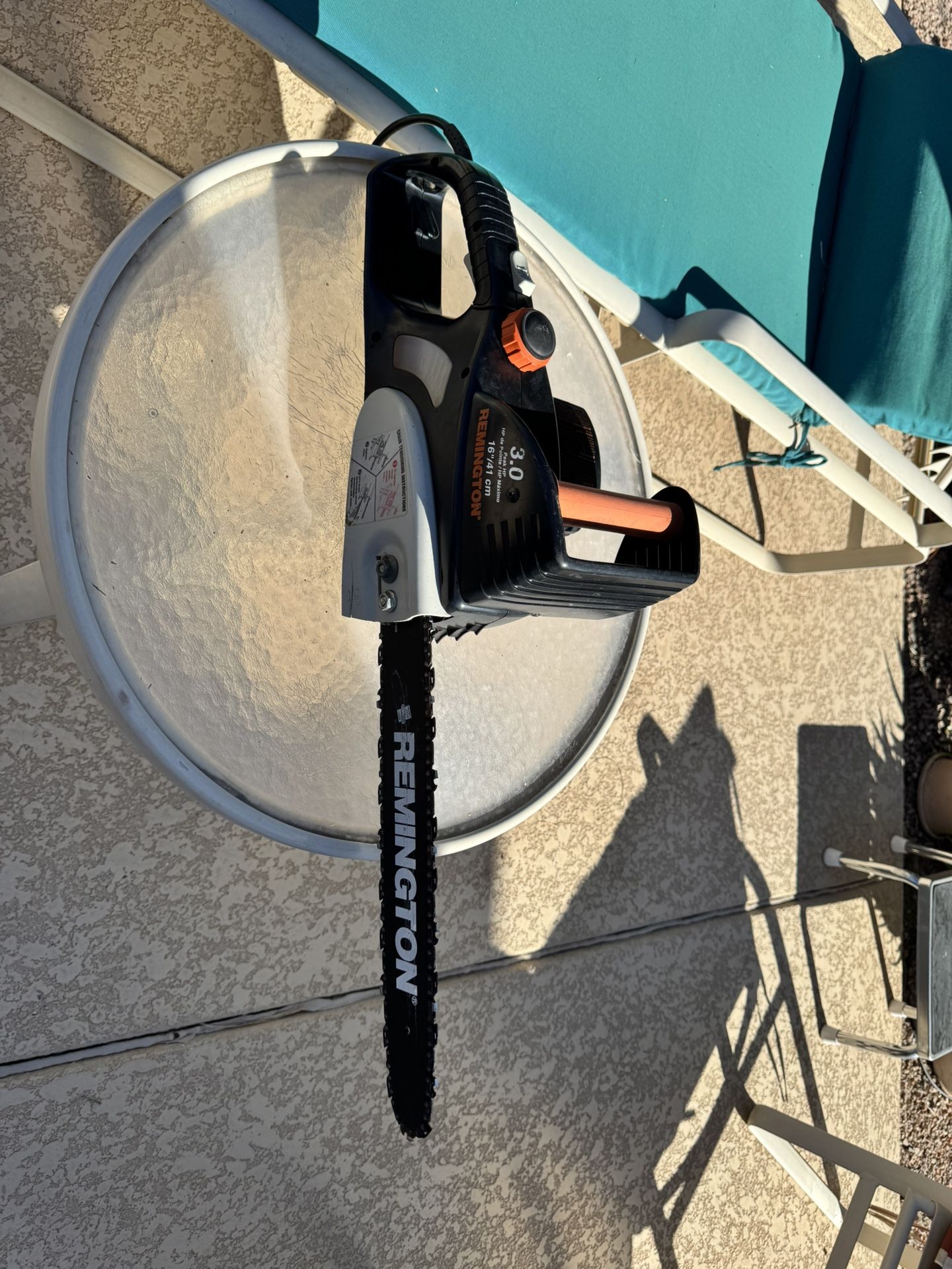 Remington Electric Chain Saw, $25