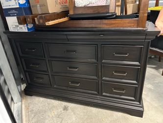 Black dresser w/ mirror .