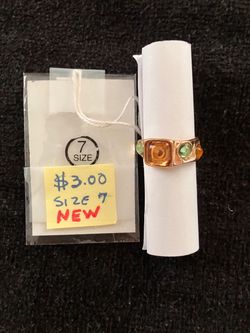 Gold ring with colored stones