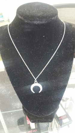 Half moon guess necklace